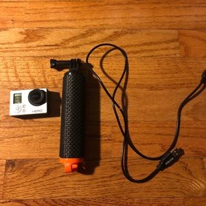 GoPro hero 3 with charger and floatation stick!